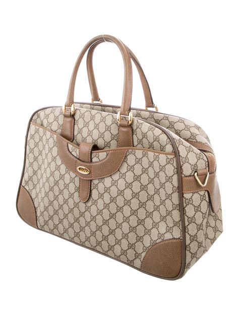 gucci weekender tote.